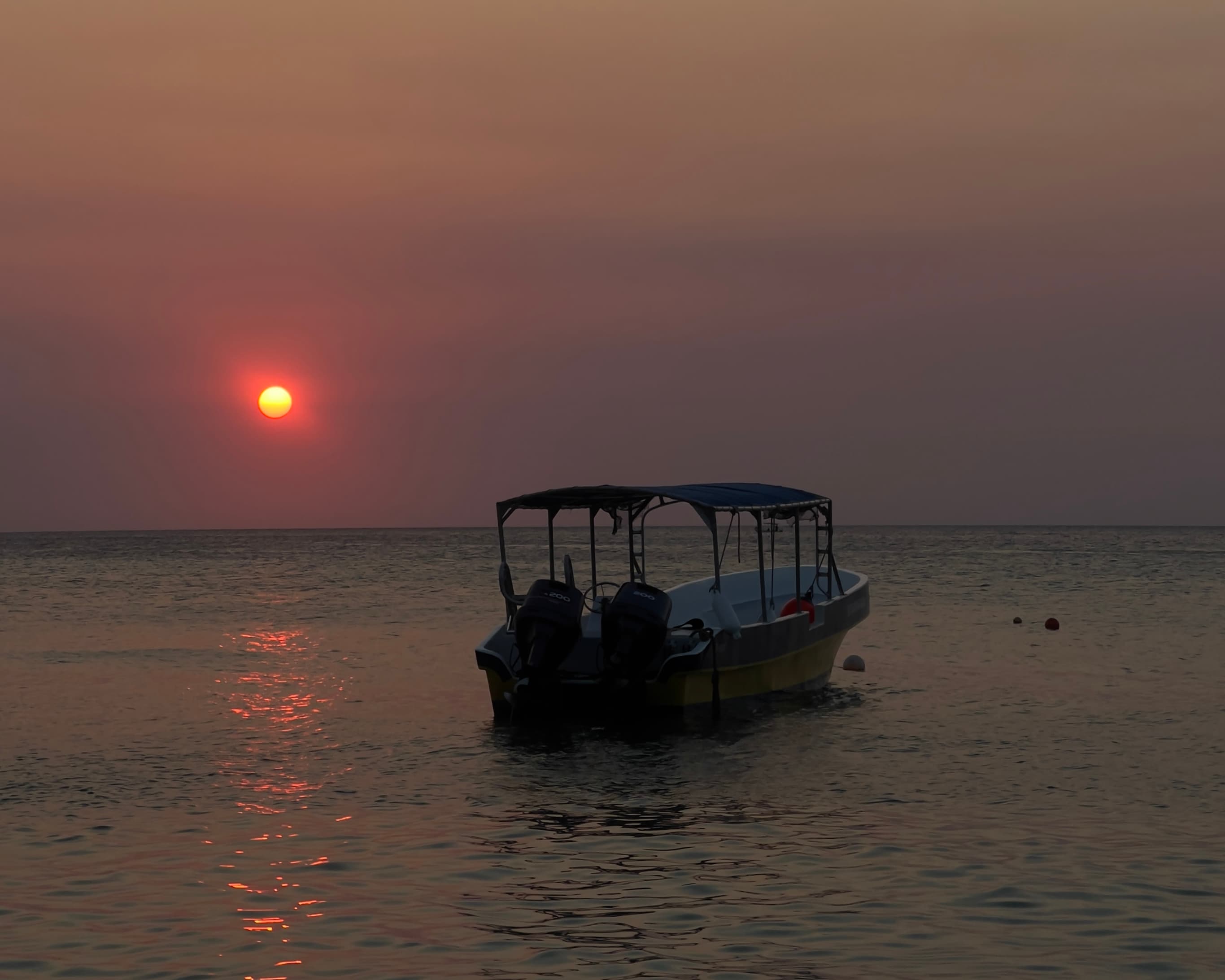 Sunset over Roatán's Caribbean waters